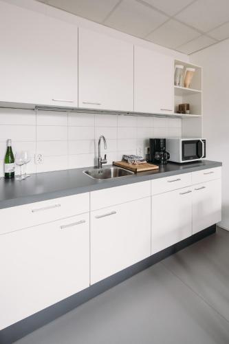Η κουζίνα ή μικρή κουζίνα στο Kranenbergh Boutique Apartments