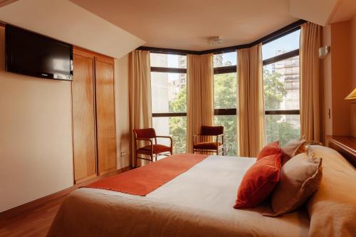 Postel nebo postele na pokoji v ubytování Primacy Apart Hotel