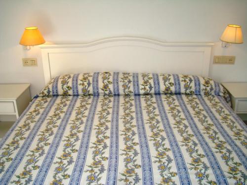 Letto o letti in una camera di Islantur Las Américas