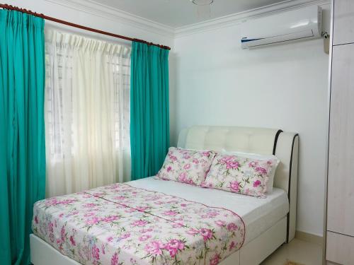 A bed or beds in a room at Homestay Farah Wangsa Maju KL