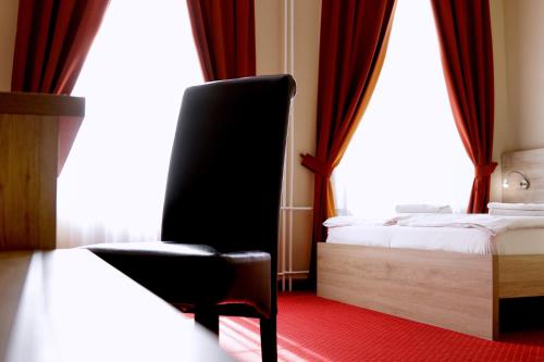 Postel nebo postele na pokoji v ubytování Hotel Stardust