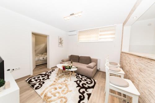 Prostor za sedenje u objektu Apartman Top Spot