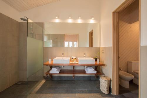 Kylpyhuone majoituspaikassa Futangue Hotel & Spa