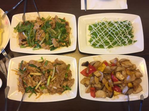 a group of four plates of food on a table at Sky Ocean in Yilan City