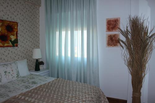 Ένα ή περισσότερα κρεβάτια σε δωμάτιο στο My apartment in Sacavém