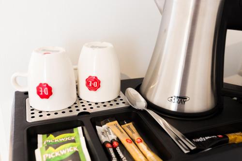Boutique Hotel Scheepersにあるコーヒーまたはお茶