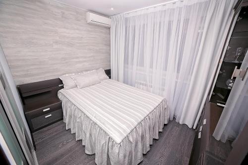 
Кровать или кровати в номере Мини-гостиница Прогресс
