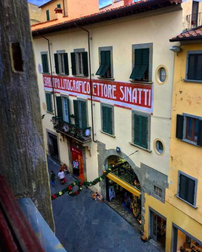 an overhead view of a building with a sign on it at Allegra Toscana - Affittacamere Guest house Arezzo in Arezzo