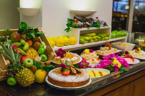 a buffet of fruits and vegetables on a table at Napa Plaza Hotel (Adults Only) in Ayia Napa