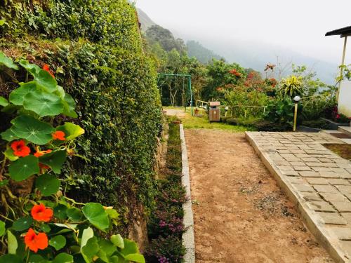 Zahrada ubytování The Cliff Resort, Munnar