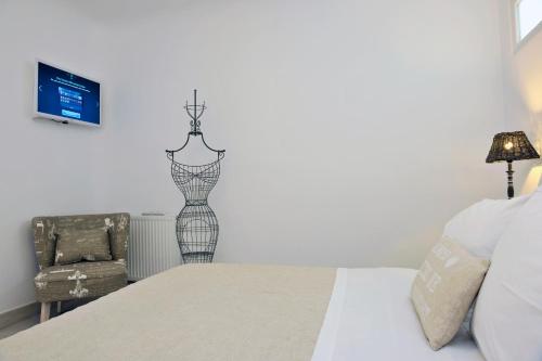 Ένα ή περισσότερα κρεβάτια σε δωμάτιο στο Paros Butterfly Villas