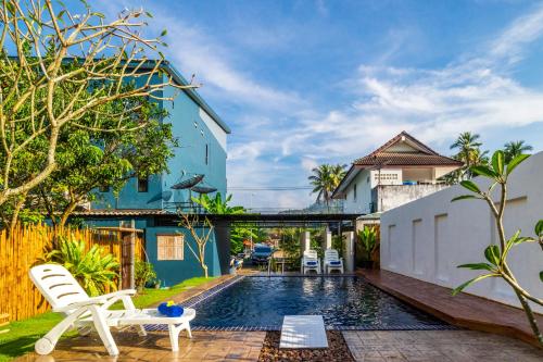 a swimming pool in the backyard of a house at S2 Residence in Ao Nang Beach
