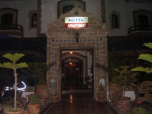 a hotel entrance with a sign that reads hotel manager at Residence Essaouira Mogador in Essaouira