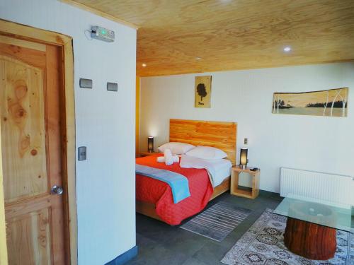 Posteľ alebo postele v izbe v ubytovaní Treca Rupan Lodge