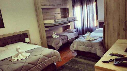 Cama o camas de una habitación en Hotel Livia