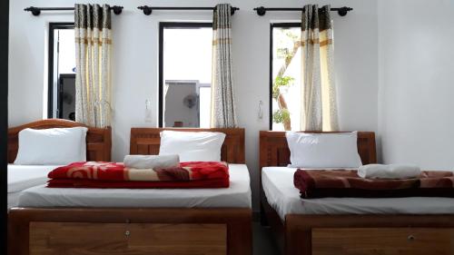 Llit o llits en una habitació de Thao Hieu Homestay Hoi An