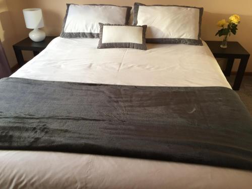 Postel nebo postele na pokoji v ubytování Penguin Seaside Homestay