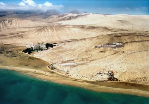 an aerial view of a construction site next to the water at Your Ocean Suite in Costa Calma