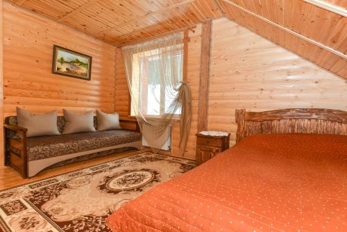 En eller flere senge i et værelse på Kozatsky dvorik