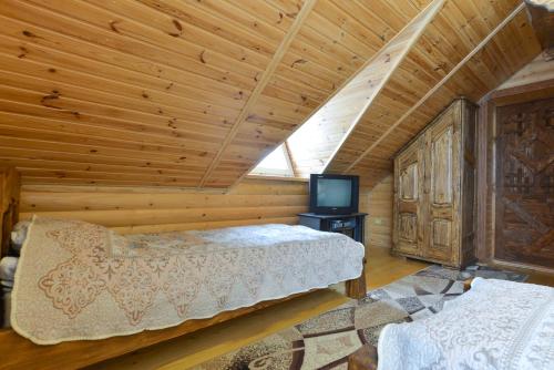 Cama o camas de una habitación en Kozatsky dvorik