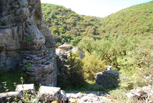 a view of a mountain with trees and rocks at Hotel Faraggi in Kleidonia
