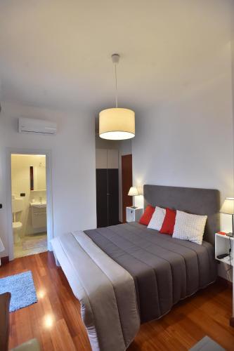 a bedroom with a large bed in a room at Residenza D'Epoca B&B Celeste in Caserta