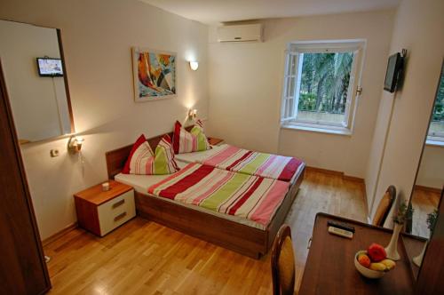 Rosemary Apartments & Rooms