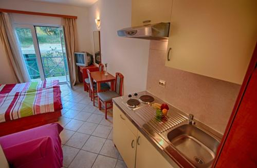 Rosemary Apartments & Rooms