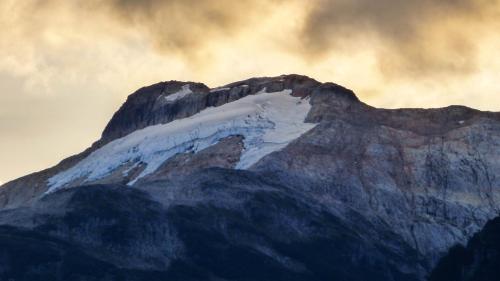 a mountain with snow on top of it at Casa Campo Carretera Austral in Puerto Cisnes