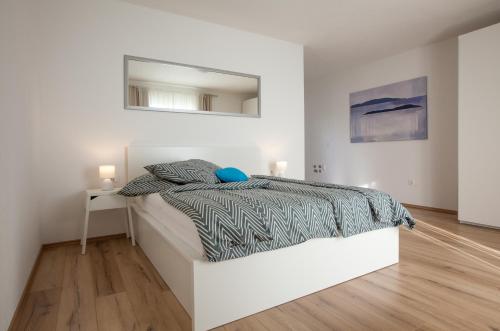 Postel nebo postele na pokoji v ubytování Apartment Penthouse Mak