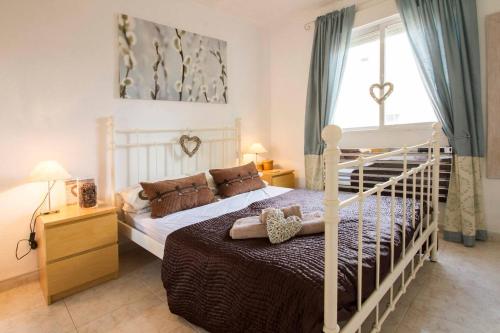 Postel nebo postele na pokoji v ubytování Casa Oasis