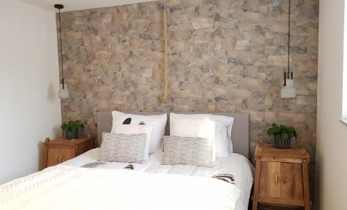Postel nebo postele na pokoji v ubytování INTIKA Beach House
