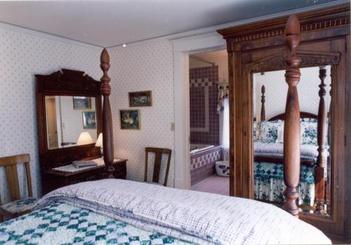 Ένα ή περισσότερα κρεβάτια σε δωμάτιο στο White Lace Inn