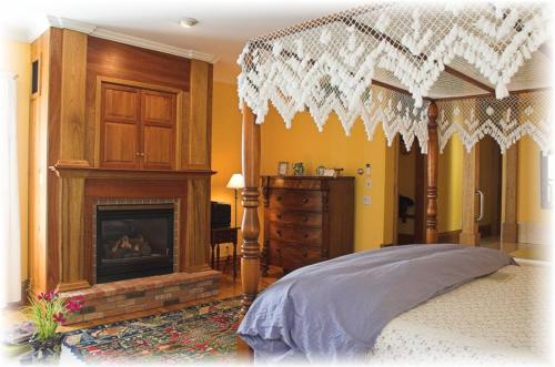 Ένα ή περισσότερα κρεβάτια σε δωμάτιο στο White Lace Inn