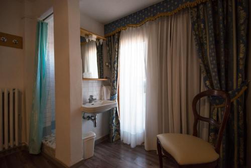 Kuchyň nebo kuchyňský kout v ubytování Albergo Casa Peron