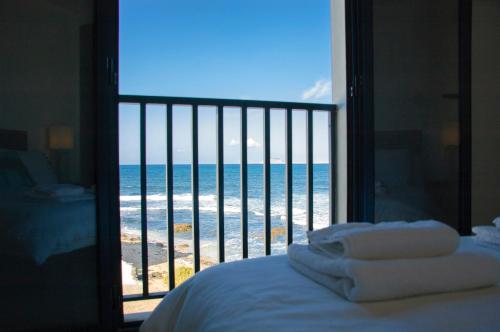 Katil atau katil-katil dalam bilik di Seaview Famara 1