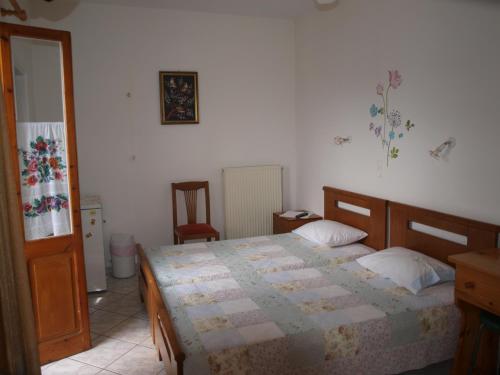 Postel nebo postele na pokoji v ubytování Batika Rooms