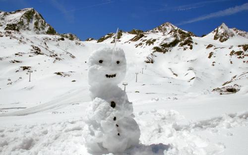 a snowman made out of snow on a mountain at Haus Ploner - Pichlerhof in Chienes