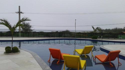 Bazén v ubytování LE BON VIVANT - LINDO APARTAMENTO PRAIA GRANDE nebo v jeho okolí