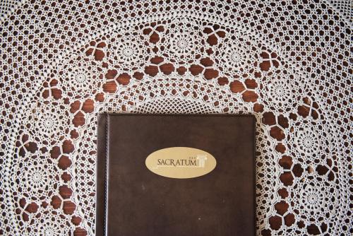 a picture of a wall with a lace curtain at Sacratum B&B Suite Spa in Mesagne