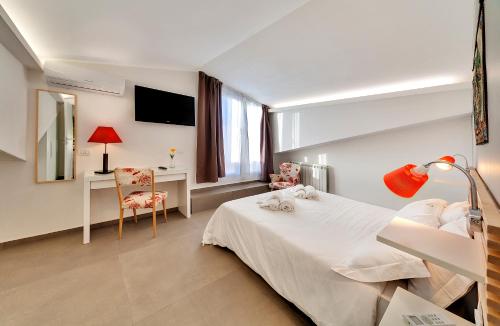 Ένα ή περισσότερα κρεβάτια σε δωμάτιο στο Residence Dei Viali