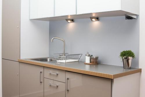 Η κουζίνα ή μικρή κουζίνα στο Apartamenty Duo