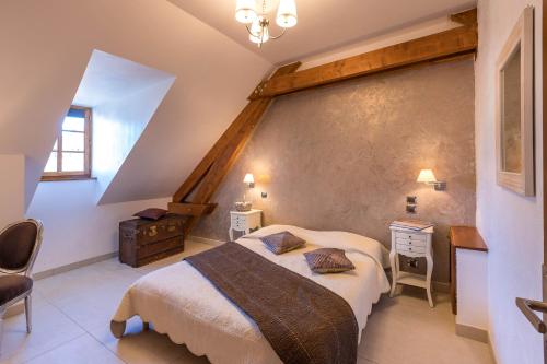 Postel nebo postele na pokoji v ubytování Le Rendez Vous de Vauban Gites & Spa