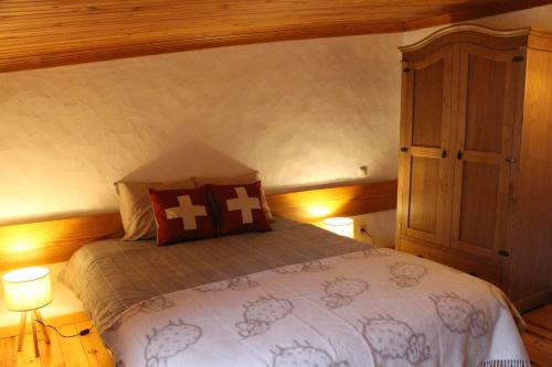 Ένα ή περισσότερα κρεβάτια σε δωμάτιο στο Casa do Tio João