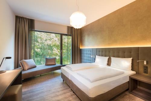 Postel nebo postele na pokoji v ubytování DECK 8 DESIGNHOTEL.SOEST