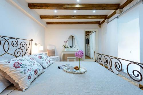 Posteľ alebo postele v izbe v ubytovaní Leona Apartments