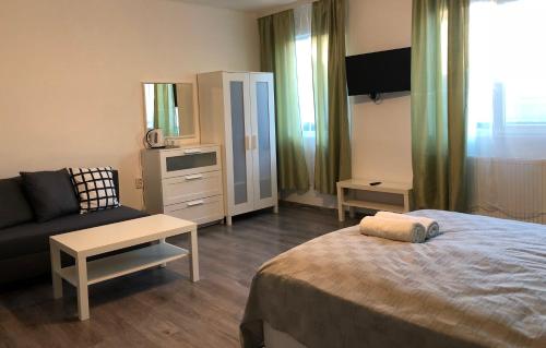 Ένα ή περισσότερα κρεβάτια σε δωμάτιο στο Terra Guest House