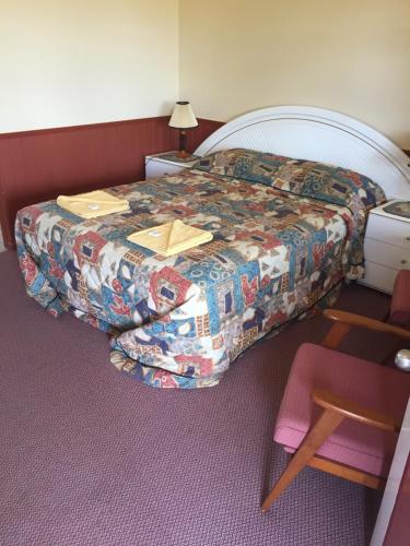 Ein Bett oder Betten in einem Zimmer der Unterkunft Rangemore Estate