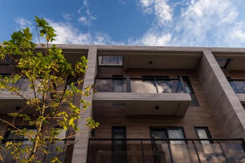 a building with a view of the sky at Buluba-Green Fields in Yuanshan