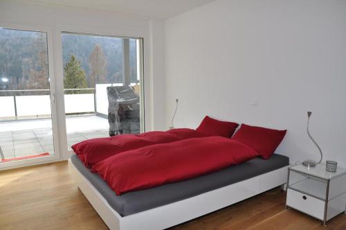 Postel nebo postele na pokoji v ubytování La Perla A2